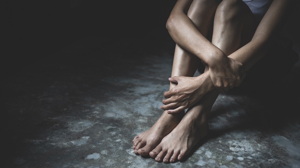 victim woman in emotional stress after sexual abuse