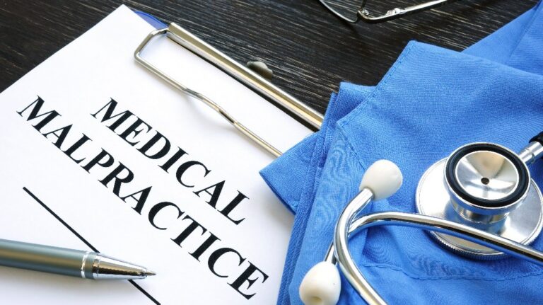 Medical malpractice, Medical suit, stethoscope and documents